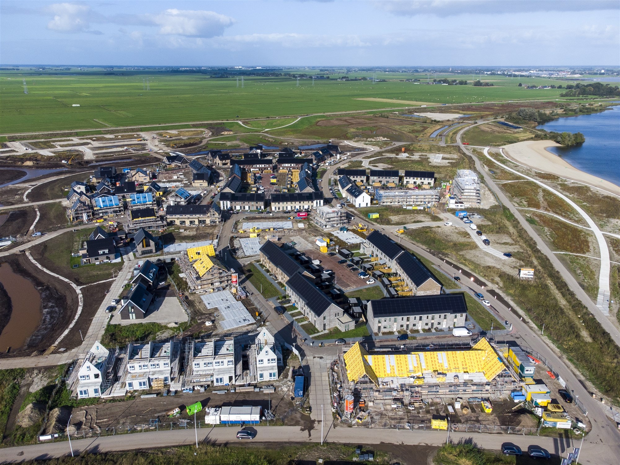 Sommige ondernemingen wezen in december in het bijzonder op een zwakke vraag uit de bouwsector. Ter illustratie: de Zwolse nieuwbouwwijk Stadshagen in de Mastenbroekerpolder. ANP.