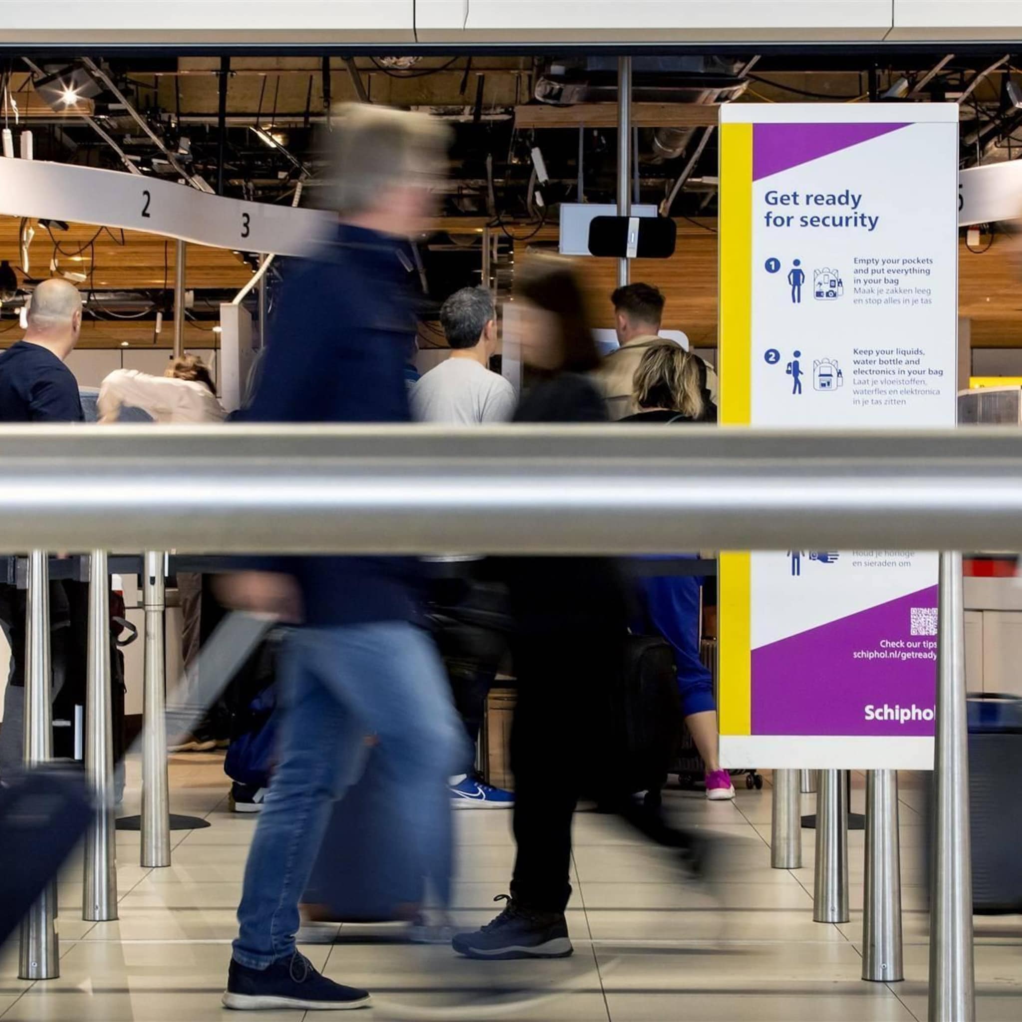 schiphol geen wachtrijen bij security in druk vakantieweekend