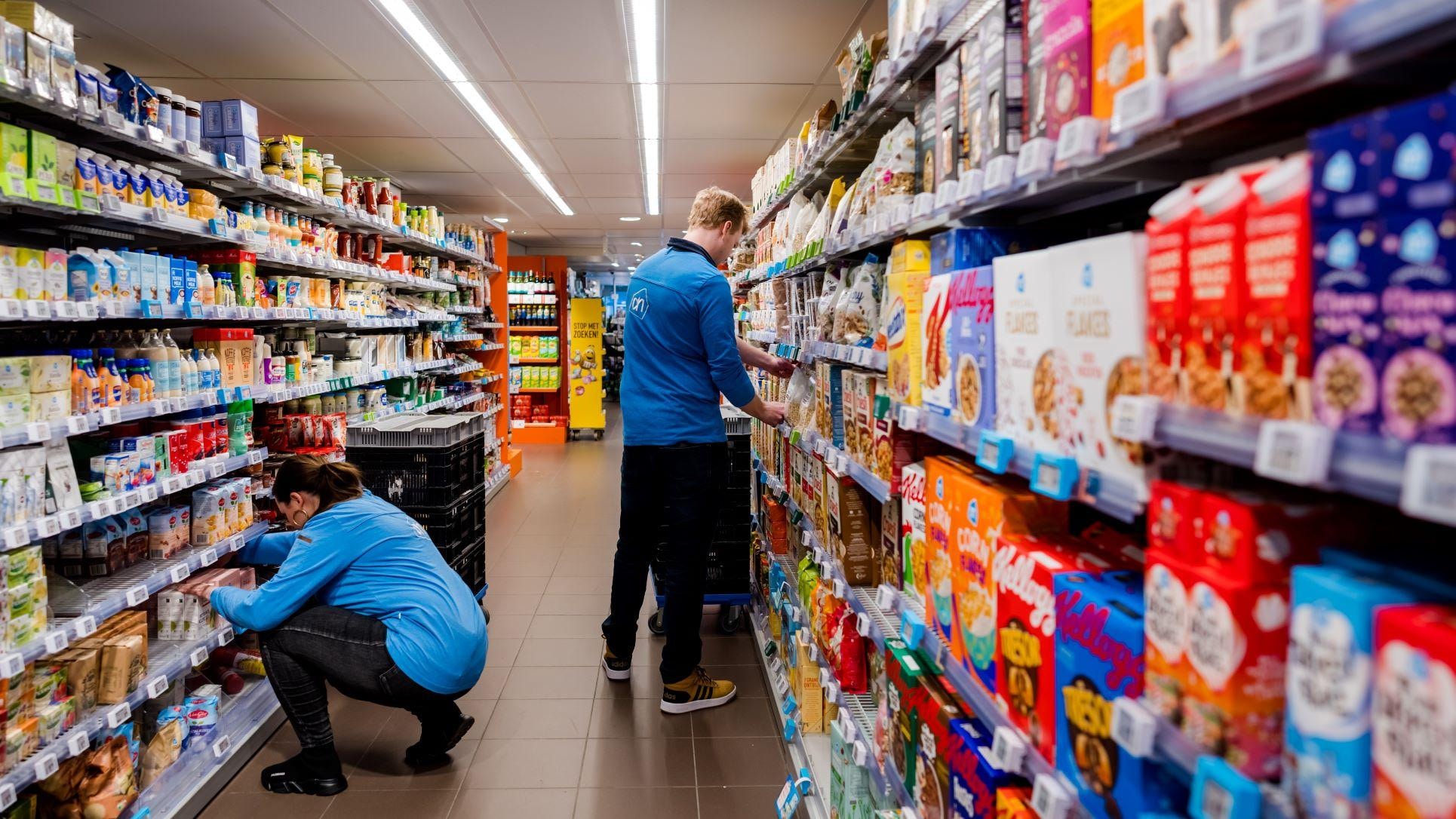 Volle schappen bomvol (huis-)merken in een Albert Heijn-filiaal in Delft. Foto: ANP