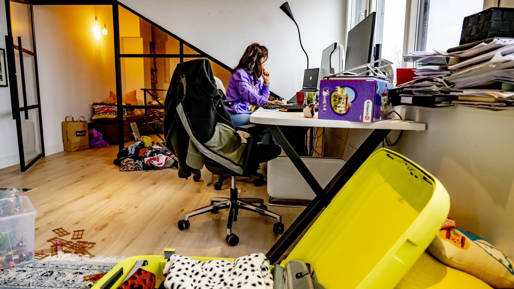 Veel werknemers snakken er na twee jaar van thuiswerk naar om weer naar kantoor te komen. Foto: ANP
