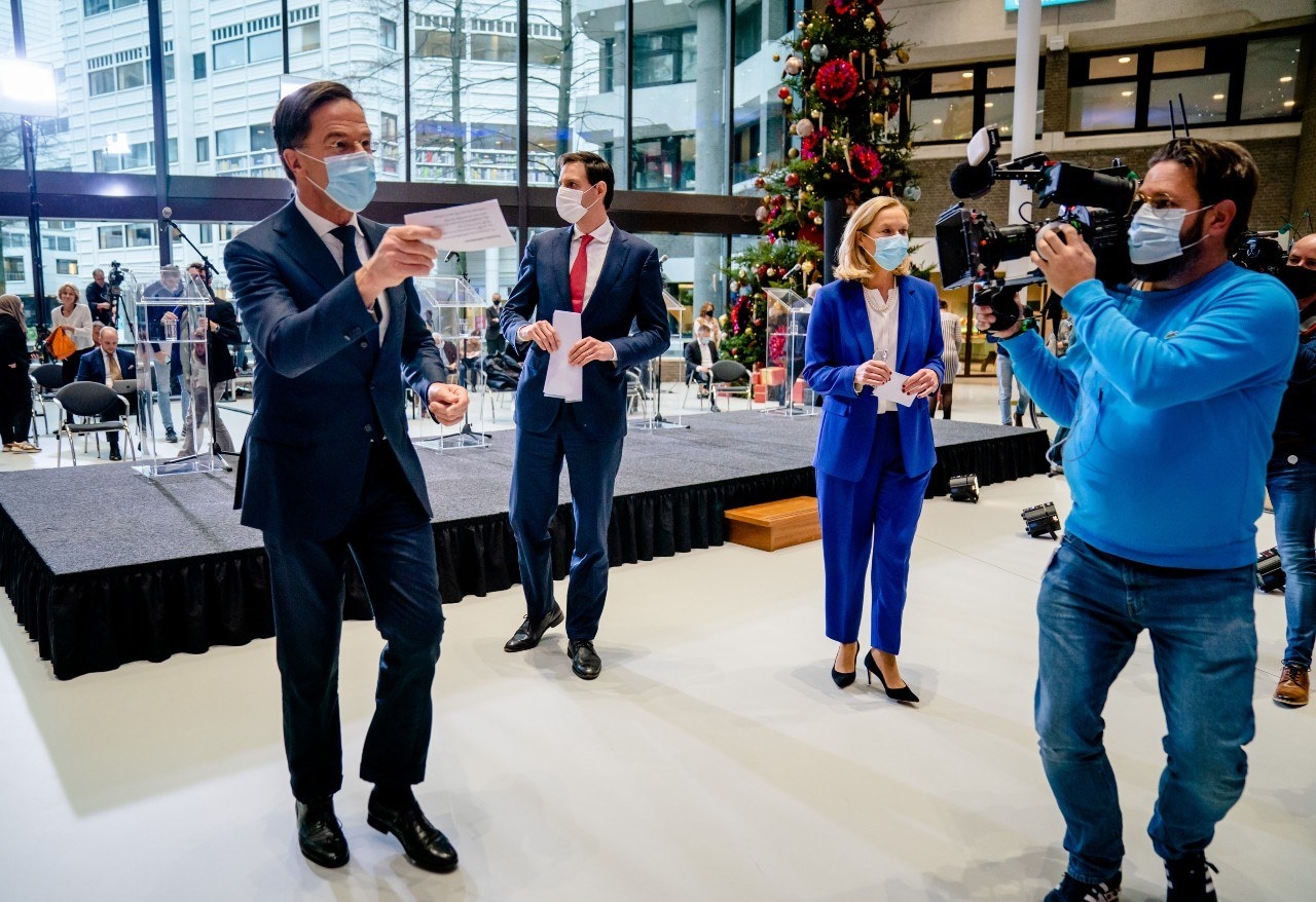 Drie politieke kopstukken van de coalitie tijdens de persconferentie rondom het regeerakkoord. Foto: ANP.
