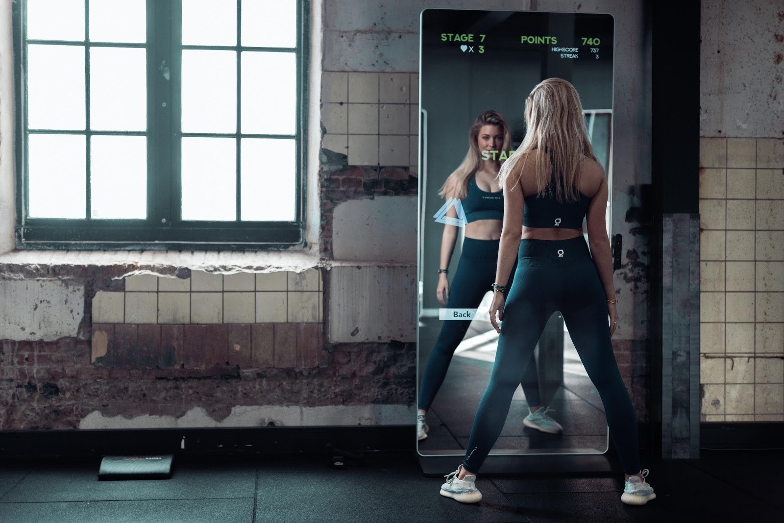 Trainen voor een interactieve spiegel maakt de workout beter, meent Fittar. Foto: Fittar