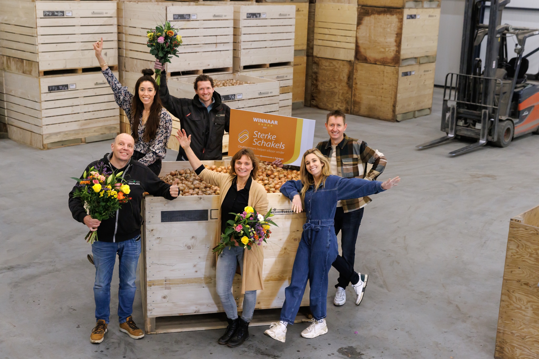 De winnaars van de Sterke Schakels WeGrowOrganic, met uiterst rechts boven Ellen Hoog mede-eigenaar Wouter Snippe. Foto: Hannie Verhoeven