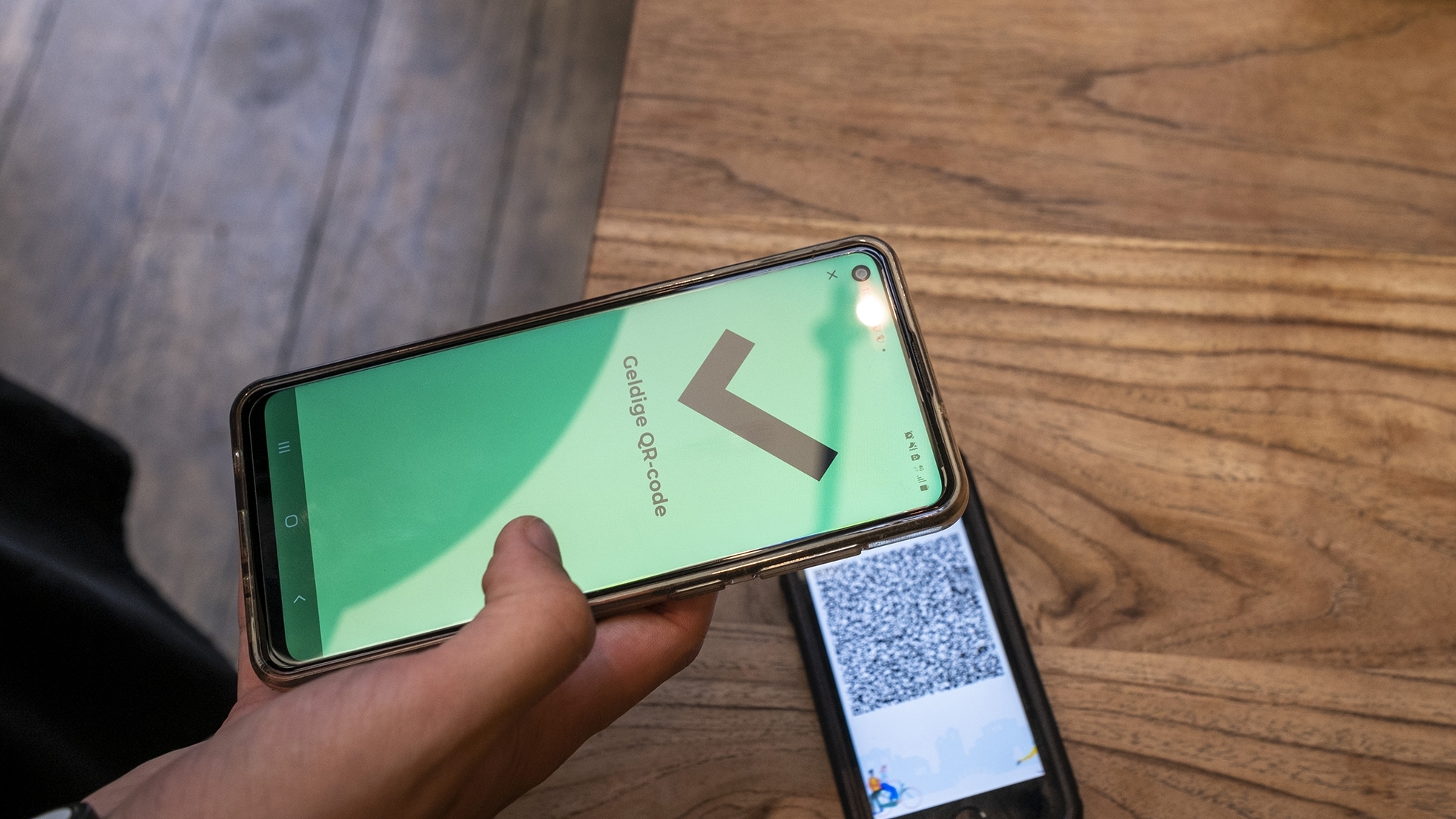 Controle van een QR-code. Afbeelding ter illustratie. Bron: ANP Foto