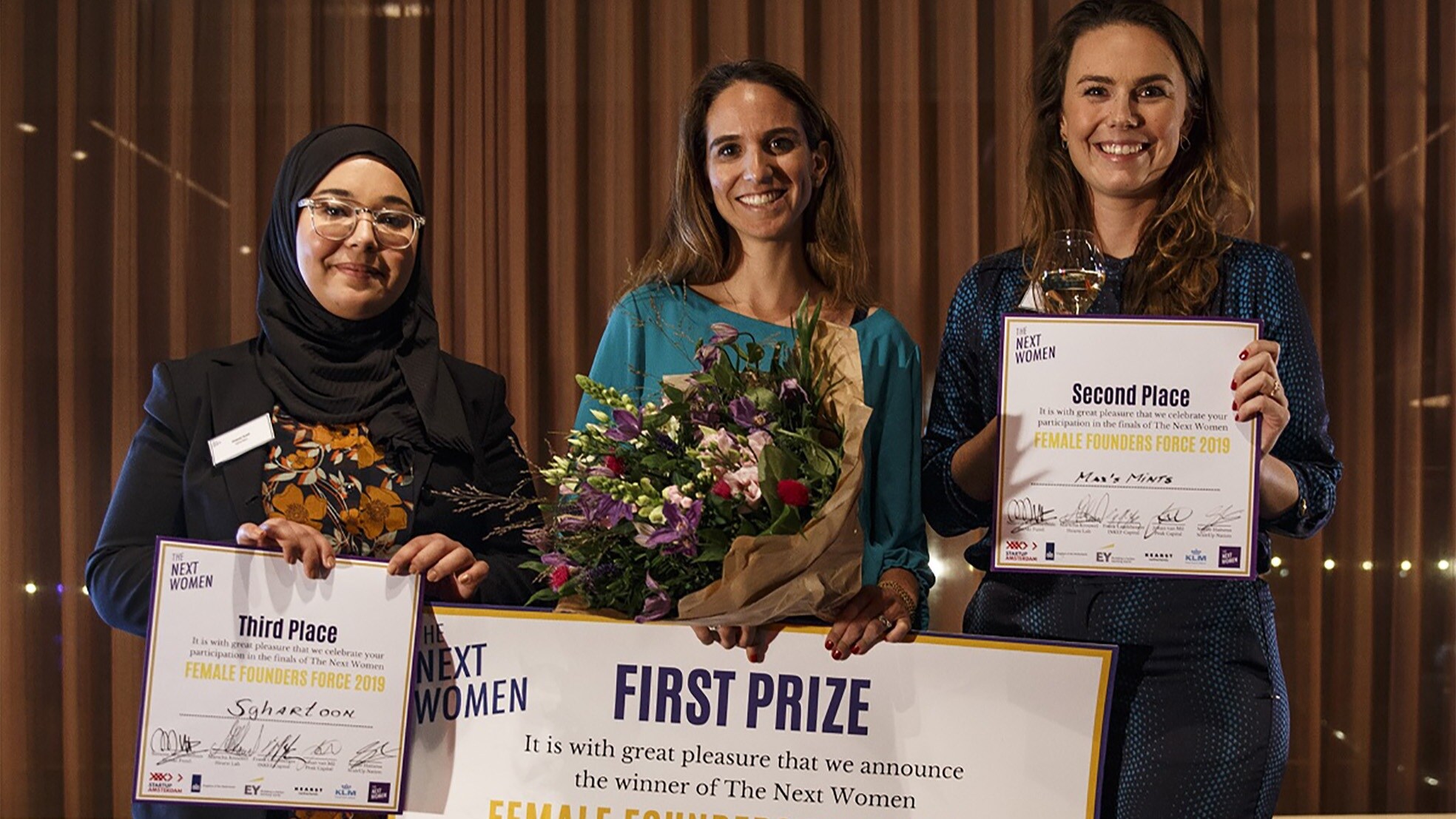 De top 3 met in het midden winnaar Tamar Schapira van SenseIT.