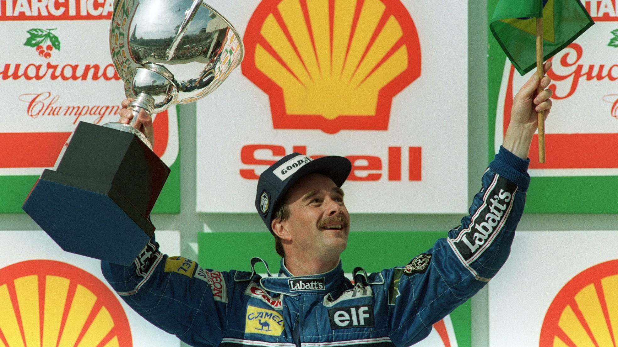 De Britse F1-coureur Nigel Mansell (Williams-Renault) na het winnen van de Braziliaanse Grand Prix in zijn kampioensjaar, 1992. Foto: ANP.,