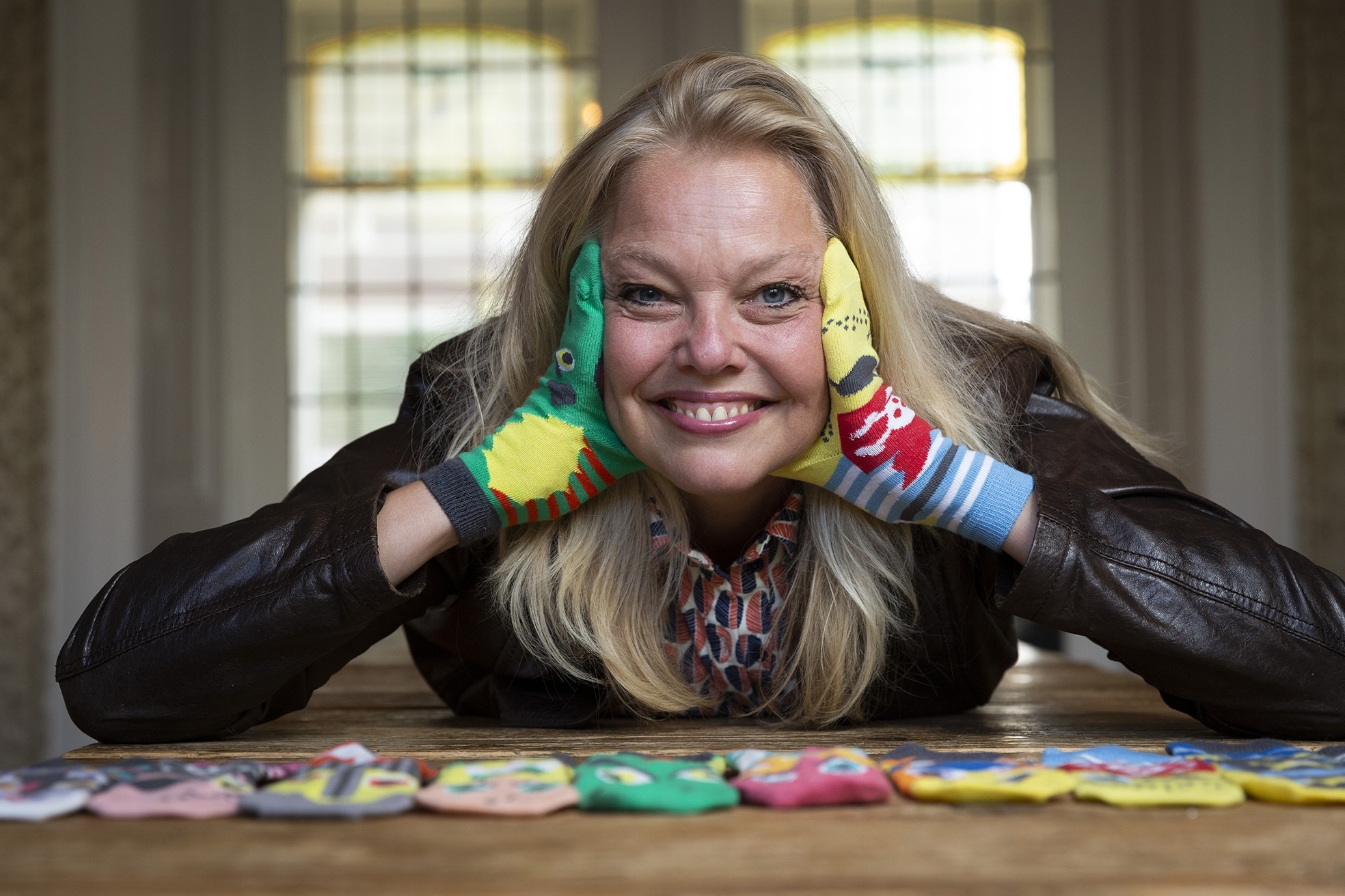 Ondernemer Nelleke van der Burg heeft inmiddels zestien verschillende sokpoppen ontworpen.