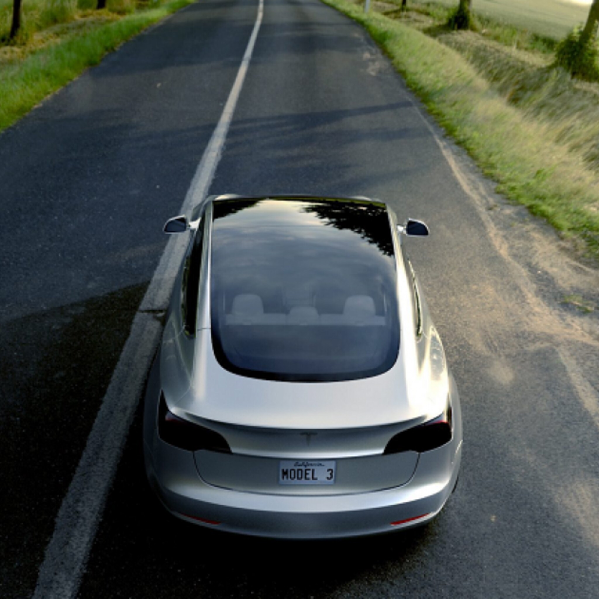 tesla showt zijn eerste auto voor de gewone man