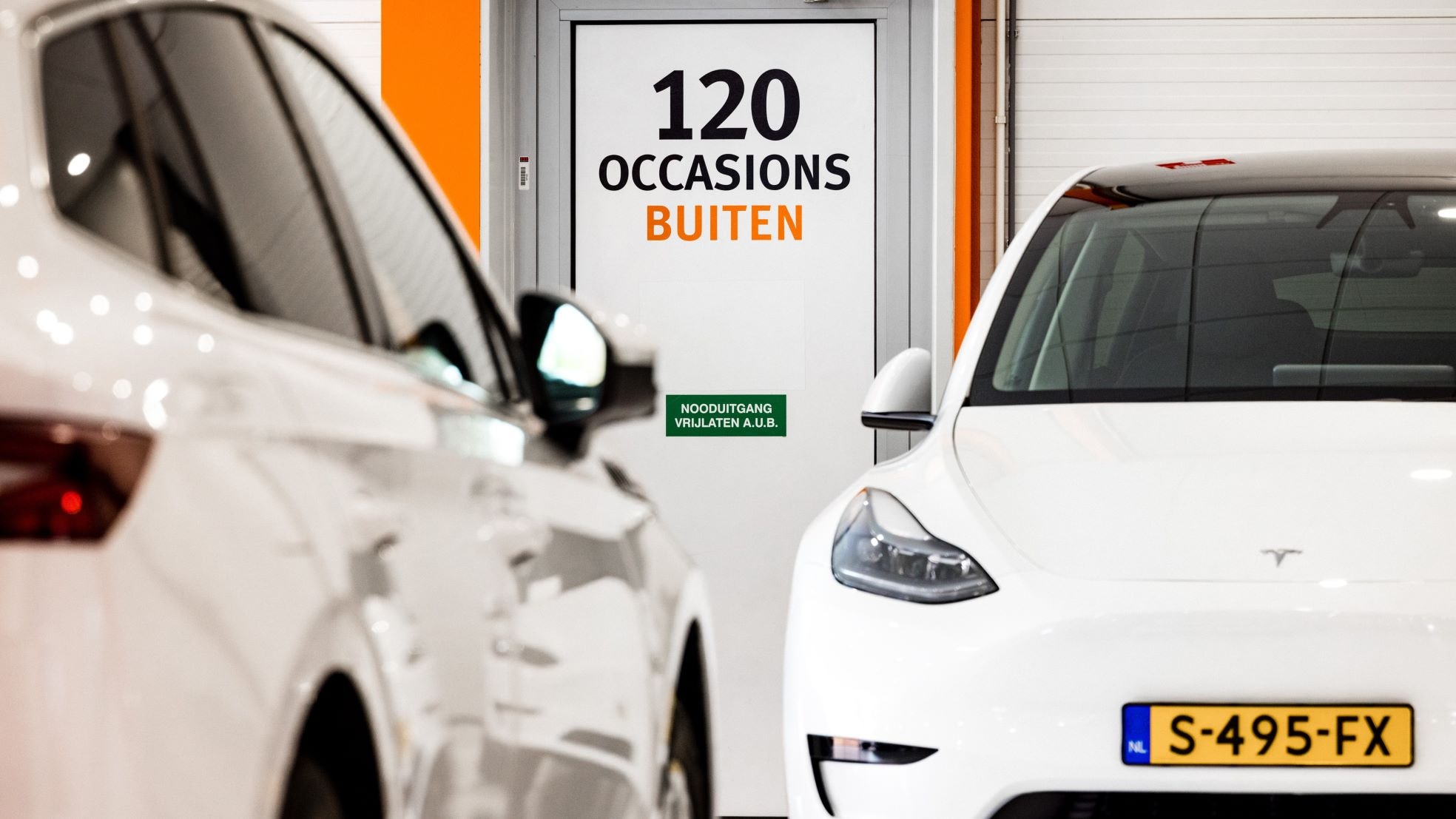 Tweedehands elektrische auto’s in een showroom. Tweedehands elektrische auto’s in een showroom. Foto: ANP