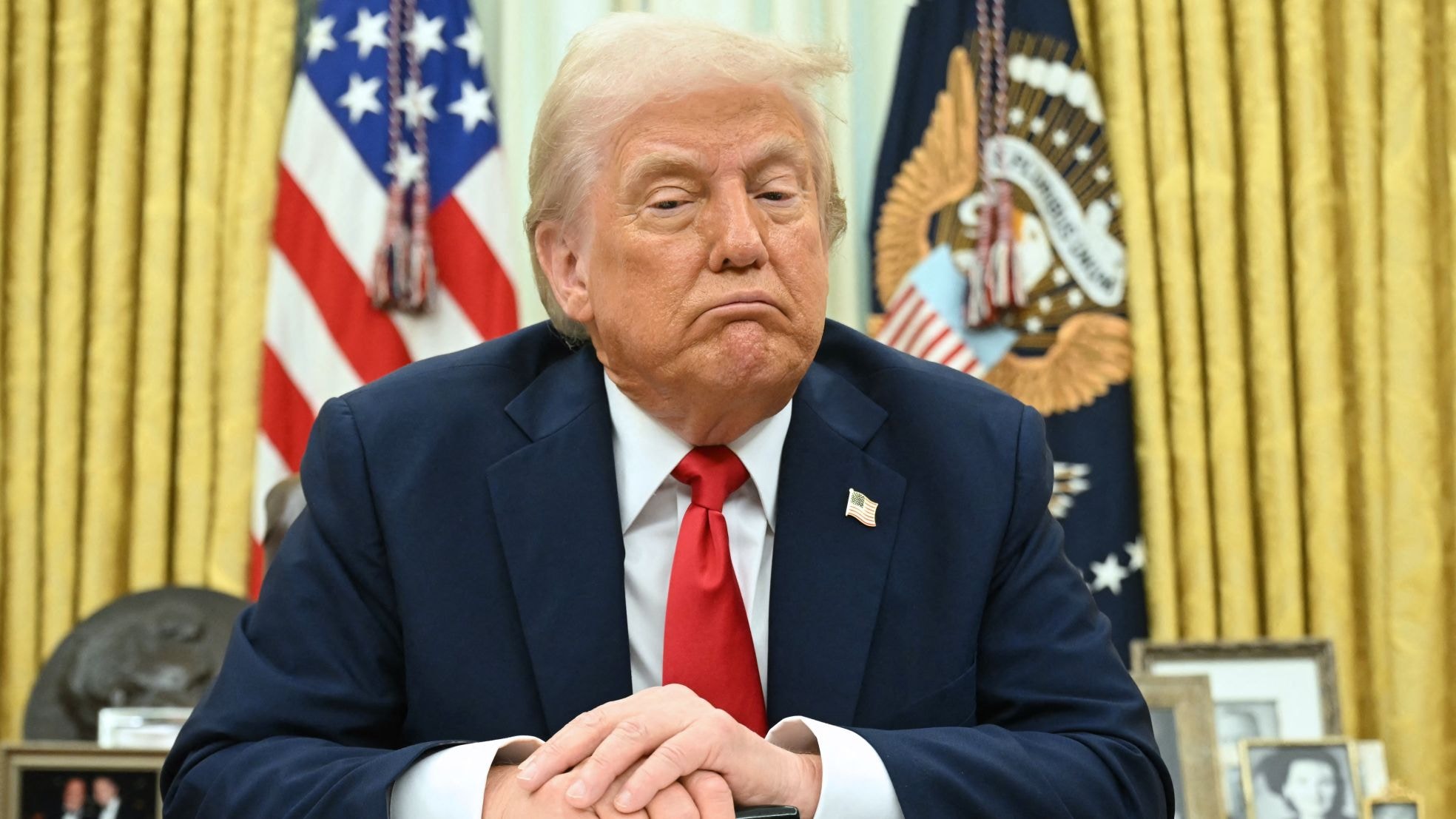 Donald Trump. President Donald Trump in de oval office. ANP/AFP