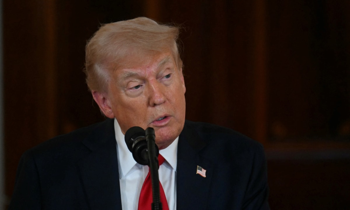 Donald Trump De gevolgen van de importheffingen blijven voor onze economie waarschijnlijk beperkt Foto: ANP