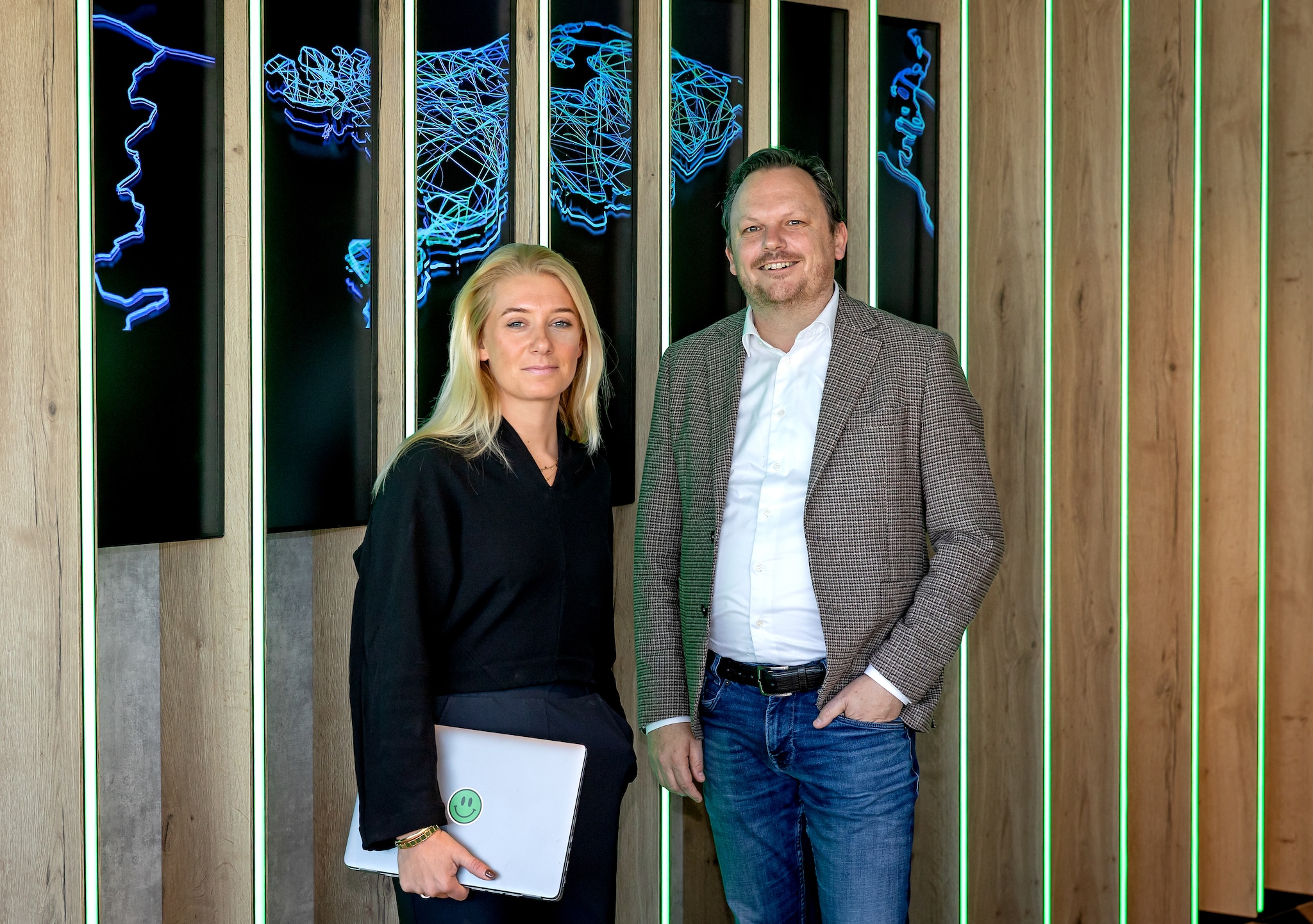 Portret van Clair van Swelm en Thomas Tolsma van KPN in Rotterdam. Foto Bart Hoogveld Claire van Swelm en Thomas Tolsma van KPN. Foto: Bart Hoogveld.