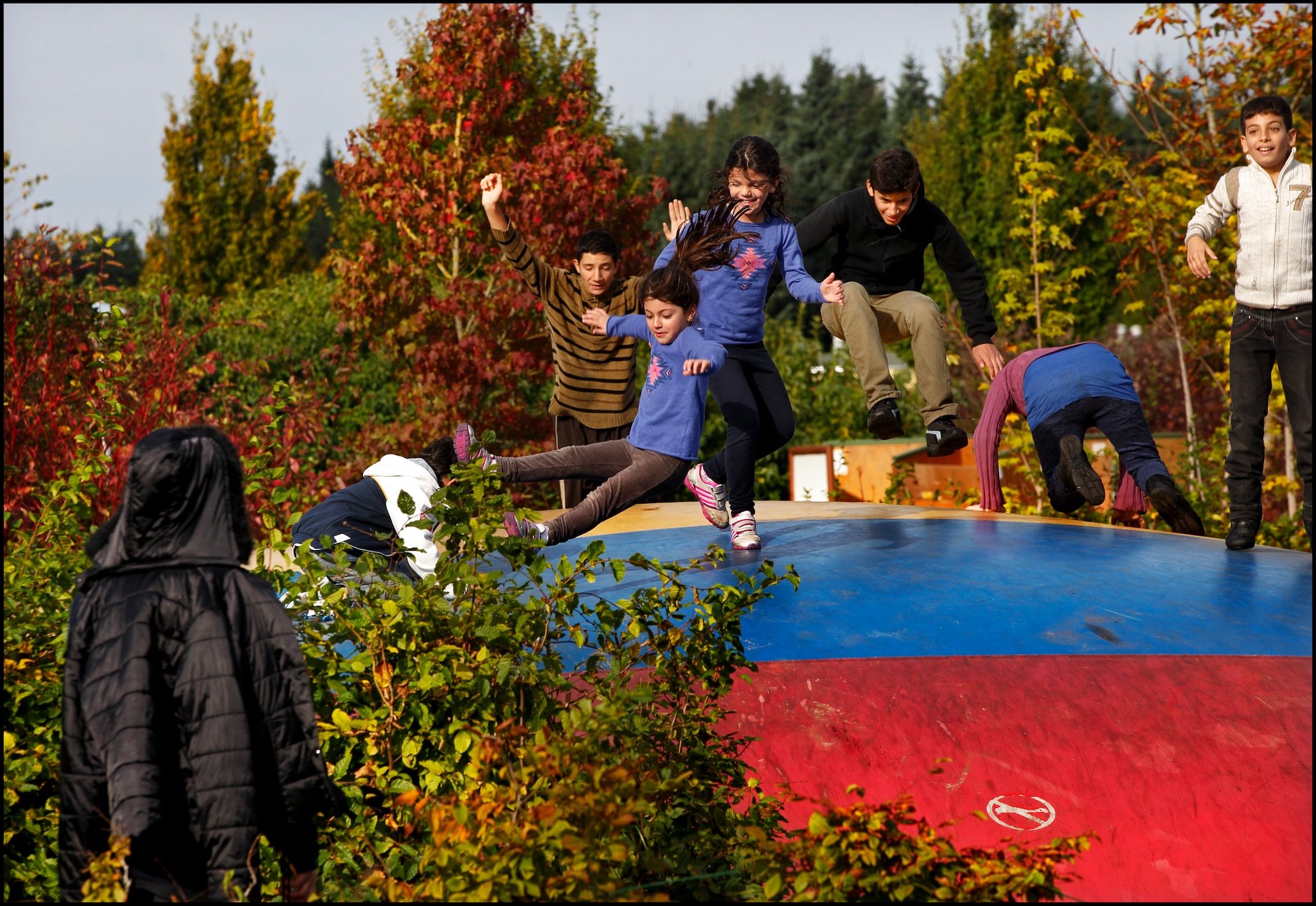 Syrische vluchtelingen in speelstad Oranje.  Pim Ras Fotografie